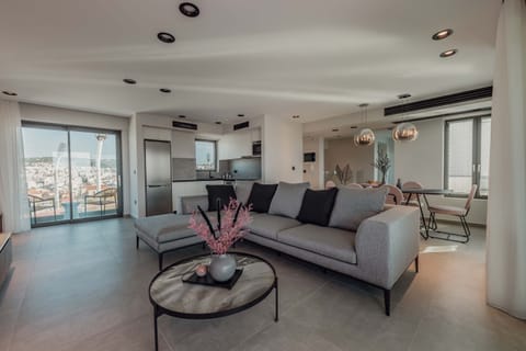 Luxury Apartment, 3 Bedrooms, Private Pool, Sea View | Living room | 42-inch flat-screen TV with satellite channels, TV, fireplace