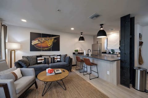 Chic design meets Nashville vibes with stylish seating and vibrant decor!