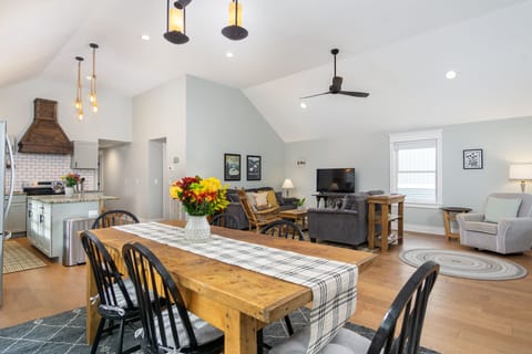 The stylish interior of Blue Heron Bungalow is filled with chic farmhouse decor & sleek appliances.