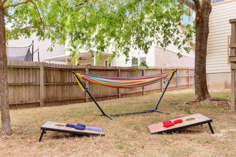 Play cornhole in the backyard. Or, just relax in the hammock and do nothing :)