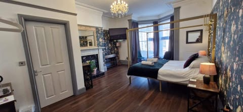 Premium bedding, pillowtop beds, laptop workspace, blackout drapes