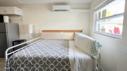 Full Size Bed with Extra Twin Trundle Bed Under and Plug on Bed Frame 
