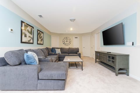 Seating area in the loft space. Showing TV wall placement.