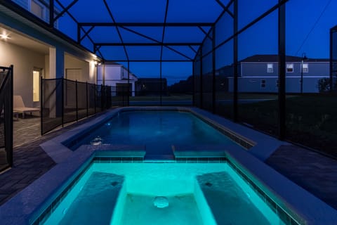 Pool view at dusk. Beautifully pristine property with gorgeous pool views.