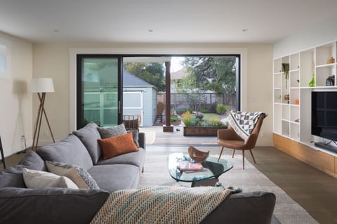 Open the big doors and connect the outdoor and indoor spaces 