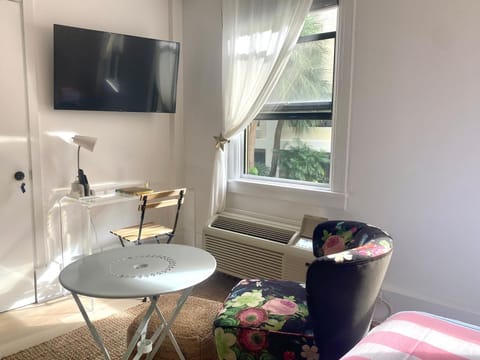 Lounge area and work space. Smart flat screen Tv and AC