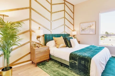 [King Suite] - memory foam mattress,  memory foam and down pillows, green and gold accents, high ceilings, city and mountain views