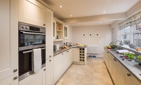 Fridge, dishwasher, cookware/dishes/utensils