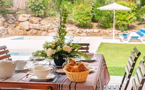 Relax and unwind on the outdoor terrace next to your private pool.