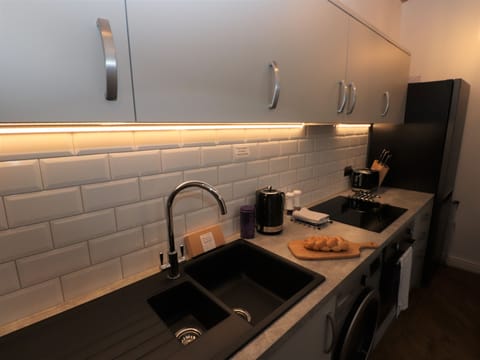 Fridge, dishwasher, cookware/dishes/utensils