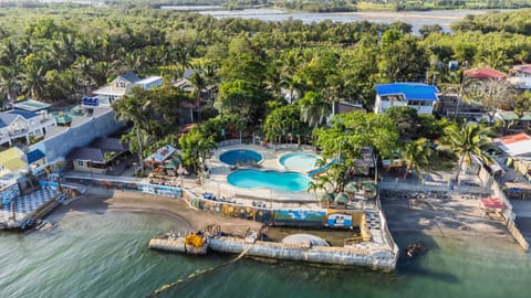 Private beach, free beach cabanas, beach umbrellas, beach bar