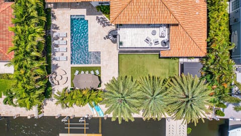 Extravagant Mediterranean coastal waterfront villa is Nestled in the streets of Seven Isles just a mile from the beach.