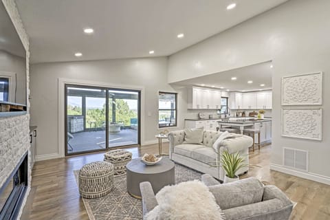 The main living room area with smart TV and firepit for romantic movie night