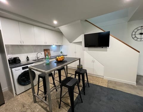 Wall mounted TV with open plan living/dining