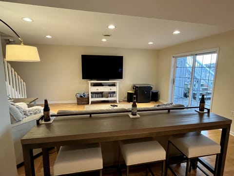 Bar seating for those sporting events on the huge OLED TV