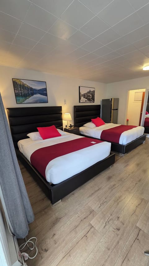 Premium Room | Blackout drapes, WiFi (free), individually furnished, bed sheets