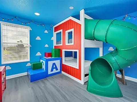 Amazing Toy Story themed bdrm with slide!! Queen over queen bunkbeds (bdrm #8).