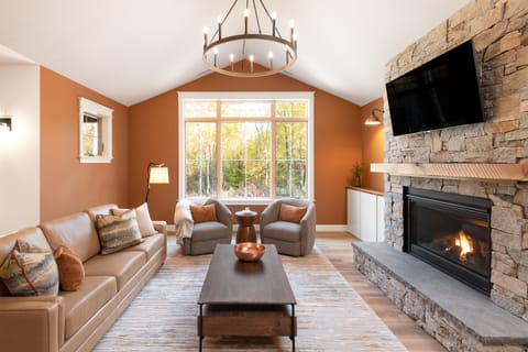 Great room with fireplace and TV