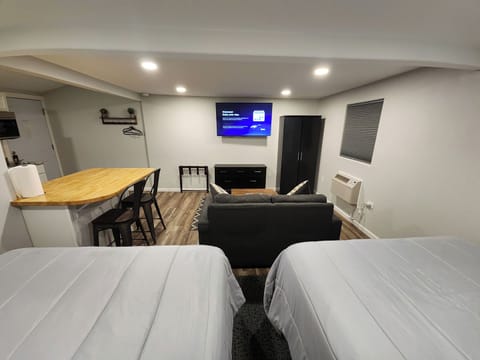 Grand Double Room, Kitchenette (5) | Laptop workspace, blackout drapes, free WiFi, bed sheets
