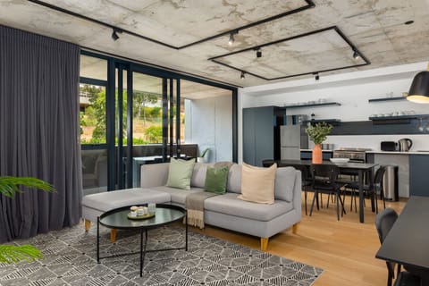 Exclusive Apartment | Living area | 48-inch flat-screen TV with cable channels, TV, Netflix
