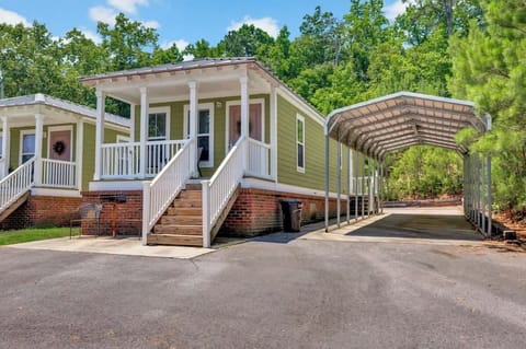 This is Cottage #4 at Fisherman's Landing equipped with your very own vehicle or boat shelter that has lights, electricity, and water.

