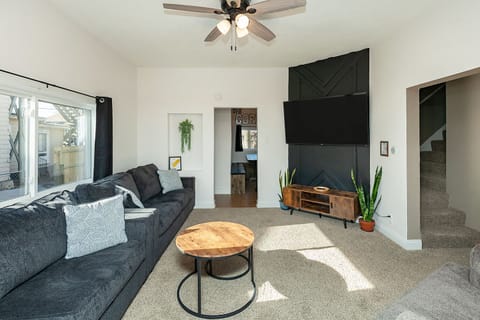 Living room is located off the entryway & dining room. Two queen sofa sleepers