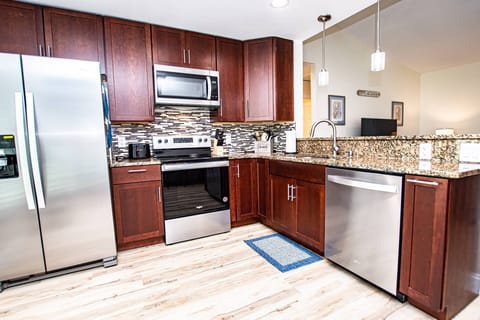 Kitchen is fully equipped with everything needed to prepare meals for a family - even a waffle maker for those fun mornings!