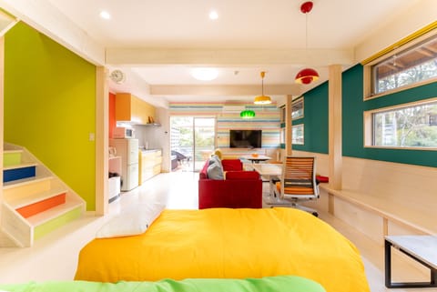 Deluxe Villa | Living area | 50-inch flat-screen TV with digital channels, TV, offices