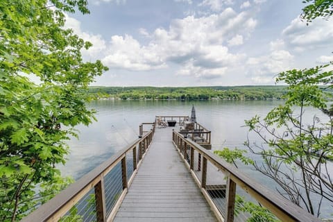 Upper sun deck with dock below...stunning views from this deck area!