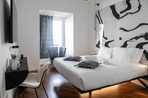 Classic Room, 1 King Bed, Non Smoking, City View | Down comforters, minibar, in-room safe, individually decorated