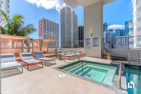 There's a shared jacuzzi at the swimming pool on the deck!