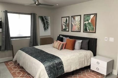 Love this room - and so do our guests!

Private en-suite bath and outdoor seating area leading to the back yard.