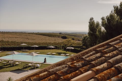 Outdoor pool, pool umbrellas, sun loungers
