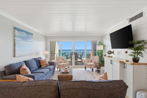 Sandy Key 818- Living Room View towards Balcony & TV