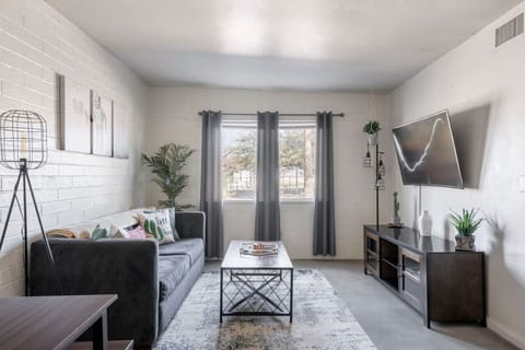 This living room is styled to impress with sleek furniture and modern accents that create a welcoming vibe.