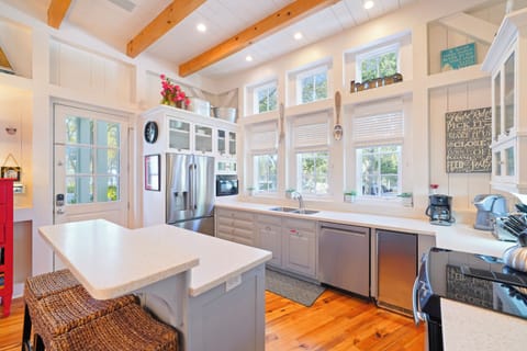 ADJACENT UPDATED KITCHEN AT ENTRANCE