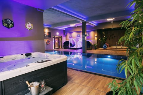Indoor pool, outdoor pool, pool umbrellas, sun loungers