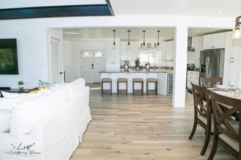 Living Room view into Open Kitchen