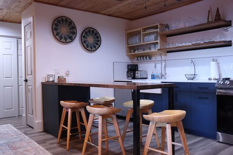 Fully equipped kitchen and dining area.