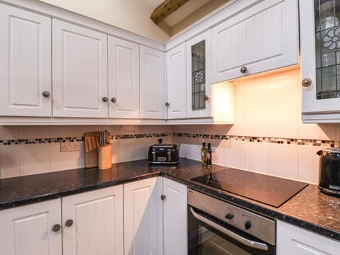 Fridge, electric kettle, toaster, cookware/dishes/utensils