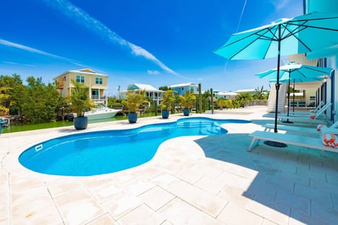Relax in the sun or seek shade while waving to passing boats at Bristol Keys.