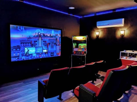 Theatre room with several arcade games