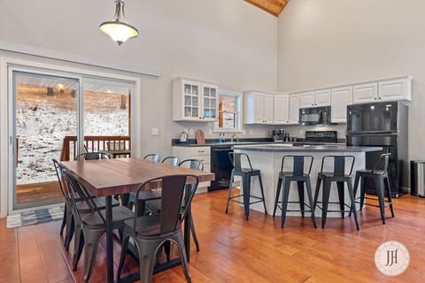 Enjoy cooking and entertaining in our bright, open kitchen, fully equipped with modern appliances, cookware, and everything you need to prepare meals with ease.