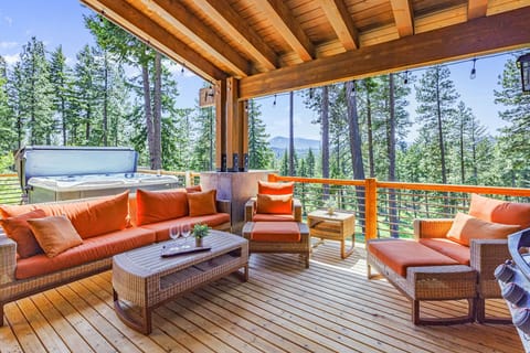 Gather around the fire and create cherished memories in this inviting mountain home outdoor space