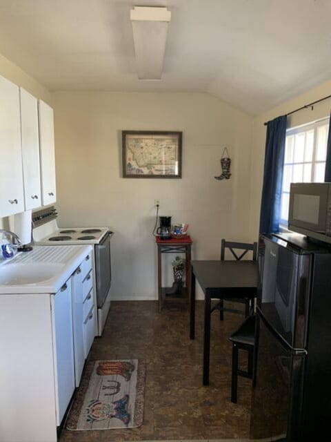 Full kitchen with seating area