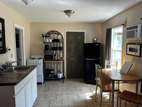 Full kitchen with seating area