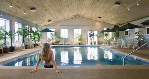 Indoor pool, seasonal outdoor pool, pool umbrellas, sun loungers