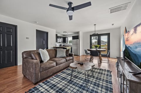 This cozy living room sofa converts into a comfy sleeper🛋☁️ making it the perfect addition to our cabin for more guest!s