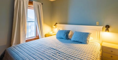 Relax and recharge in this comfortable bedroom.