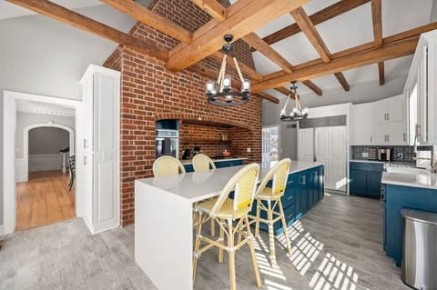 Kitchen w/ Extended Island  and waterfall end